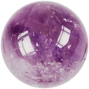 Photo d'une boule de massage en pierre d'améthyste