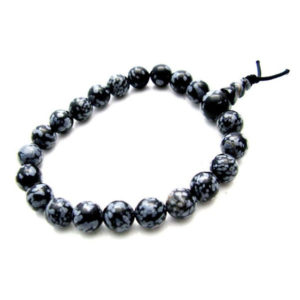 Photo d'un bracelet mala en pierre d'obsidienne mouchetée